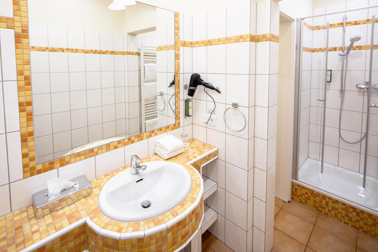 Heidelworld Aparthotel Heidelberg Bagian luar foto
